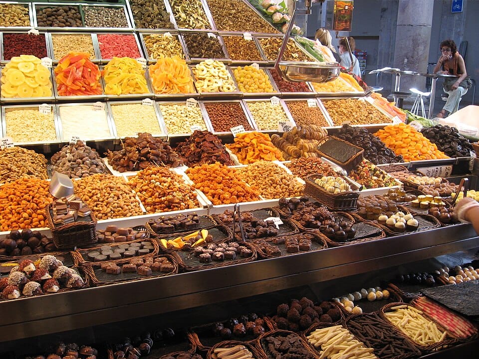 A tasting counter displaying assorted premium dry fruits